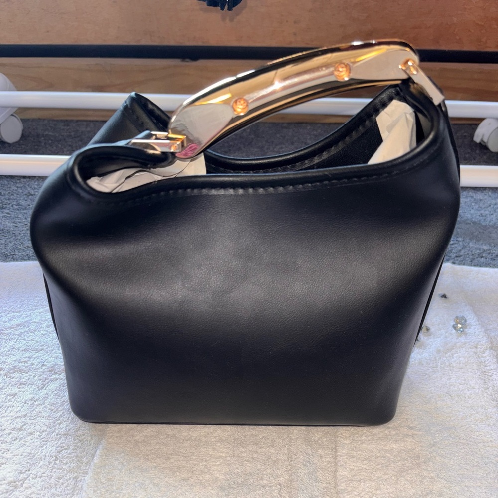Classic Black Leather Top-Handle Bag with Gold Accent